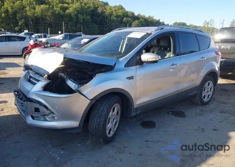 2014 Ford Escape Titanium z USA, uszkodzony, nr VIN 1FMCU9J92EUC05477